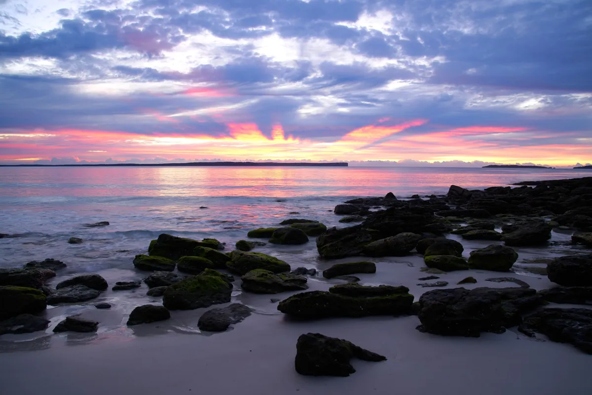 Dusk light on the rocky shore