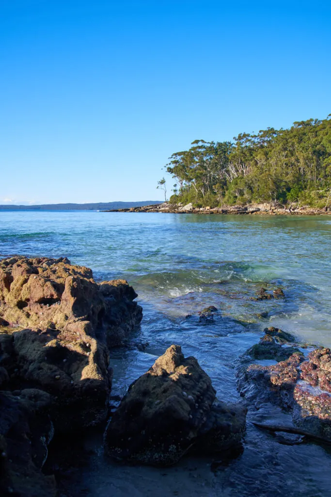 Rocky shore and still water in Jervis Bay